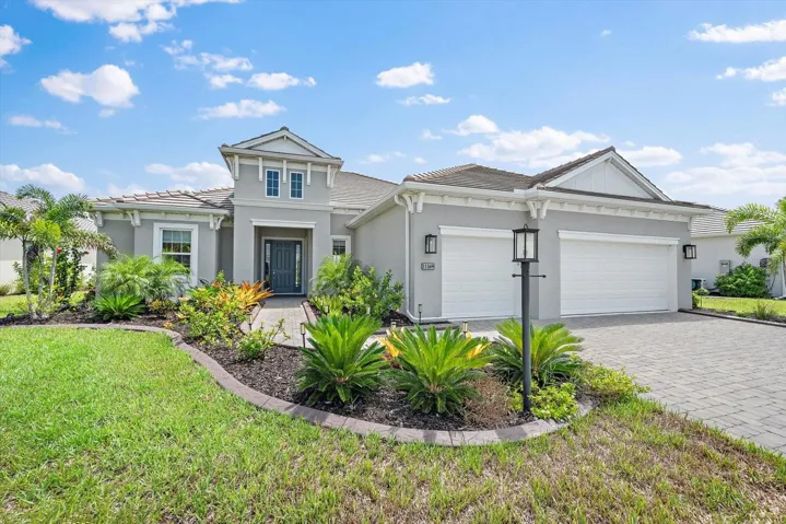 Welcome Home to 11169 Hogan Circle in Boca Royale!