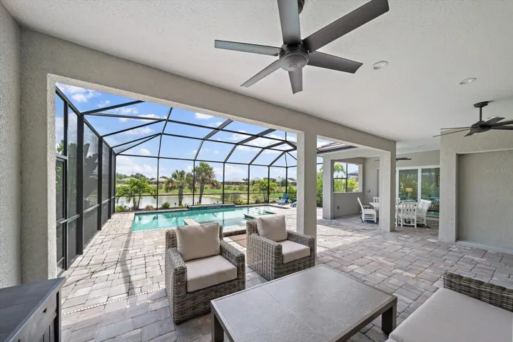 Extended covered lanai with plenty of space for relaxing and entertaining.