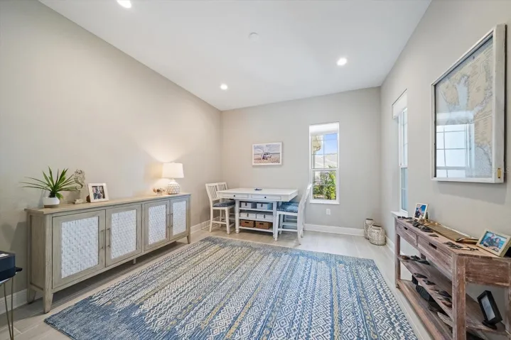 Office/Hobby room located off of the living room in front of home.