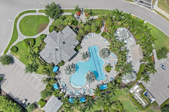 Community pool with lap length, spa, and clubhouse.