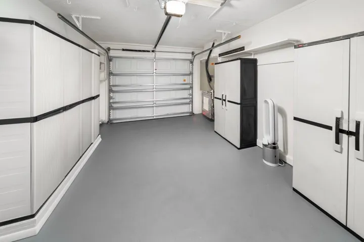GARAGE. LOTS OF STORAGE. STILL MORE THAN ENOUGH ROOM FOR YOU CAR, SUV, OR TRUCK.