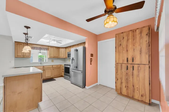 Breakfast nook leading to kitchen