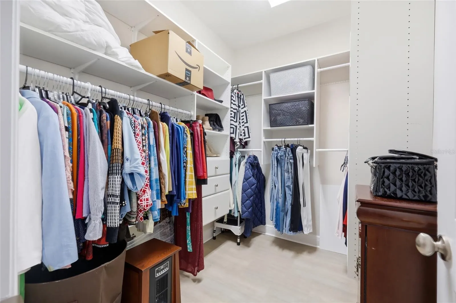 California Style Walk In Closet inside the Primary Bedroom #2