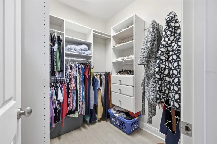 California Style Walk In Closet inside the Primary Bedroom #1
