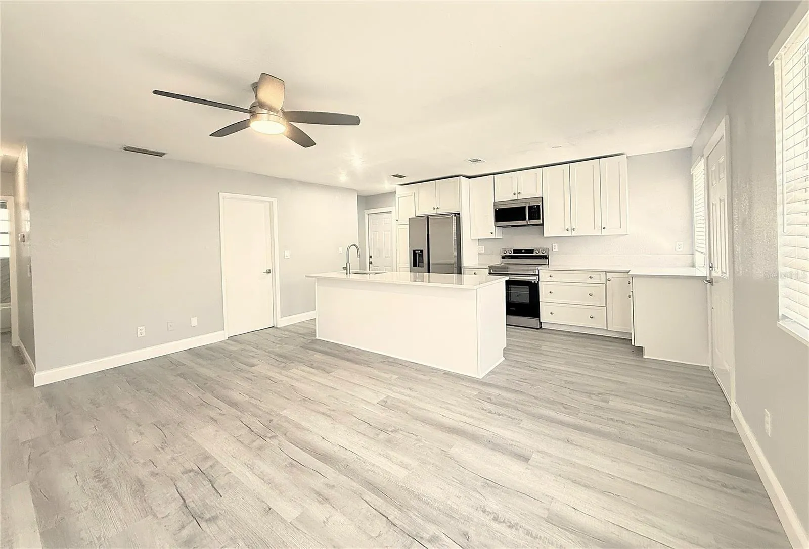 Living room and kitchen from Porch