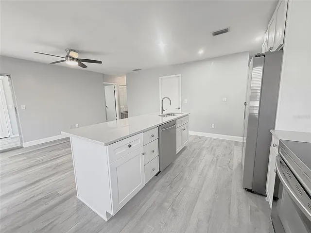 Kitchen and great room from front door
