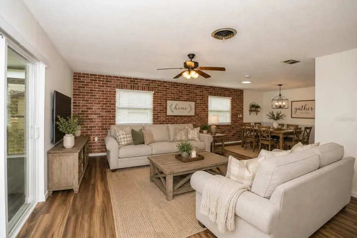 Great room and dining area staged