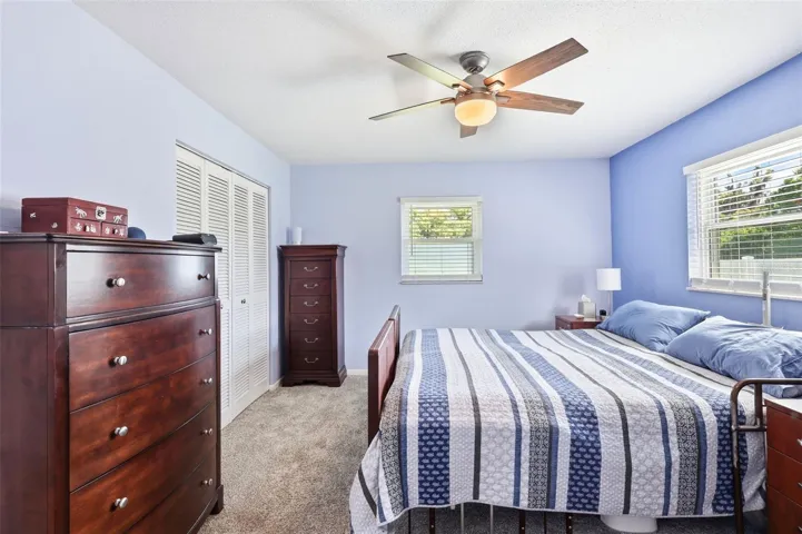 Primary bedroom from full bath entrance.