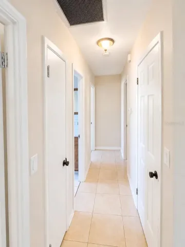 Hallway to three other bedrooms