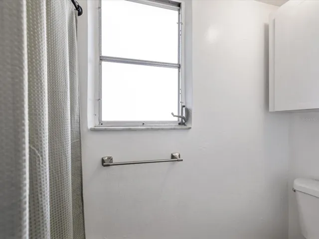 Secondary bathroom with fully remodeled shower