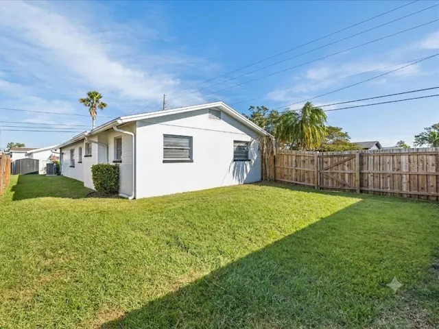 Large fenced backyard.