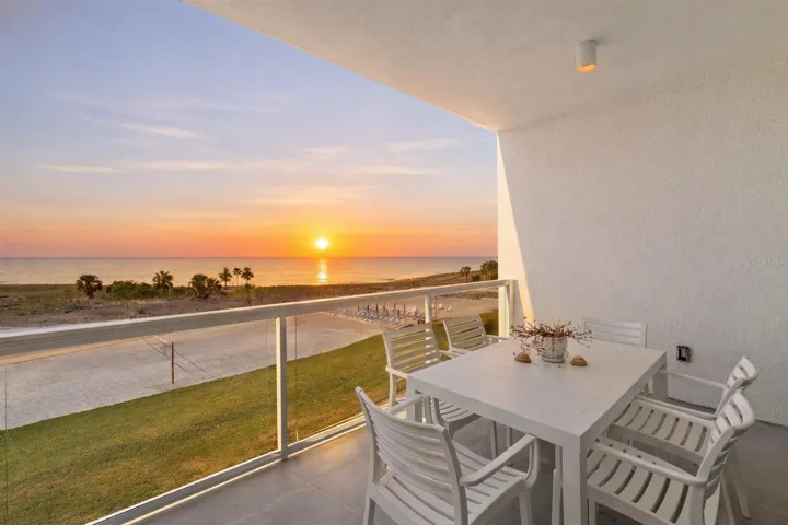 Completed in October 2023, this luxury 3rd-floor unit offers unobstructed beach and Gulf views from its spacious private balcony, providing an exceptional coastal experience with true beachfront positioning. PERFECT BALCONY SETTING