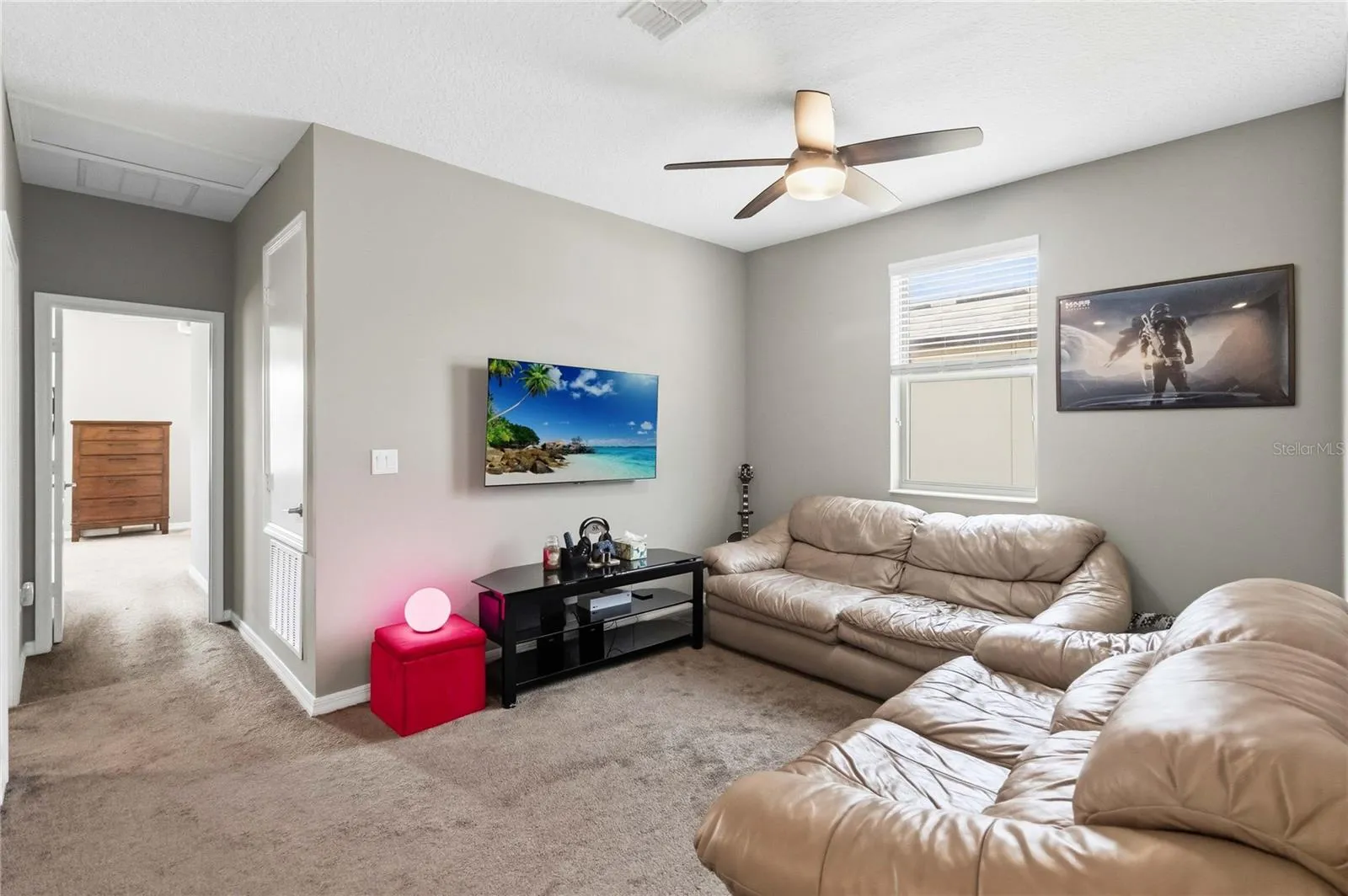 Flexible upstairs space for lounging, work, or play!