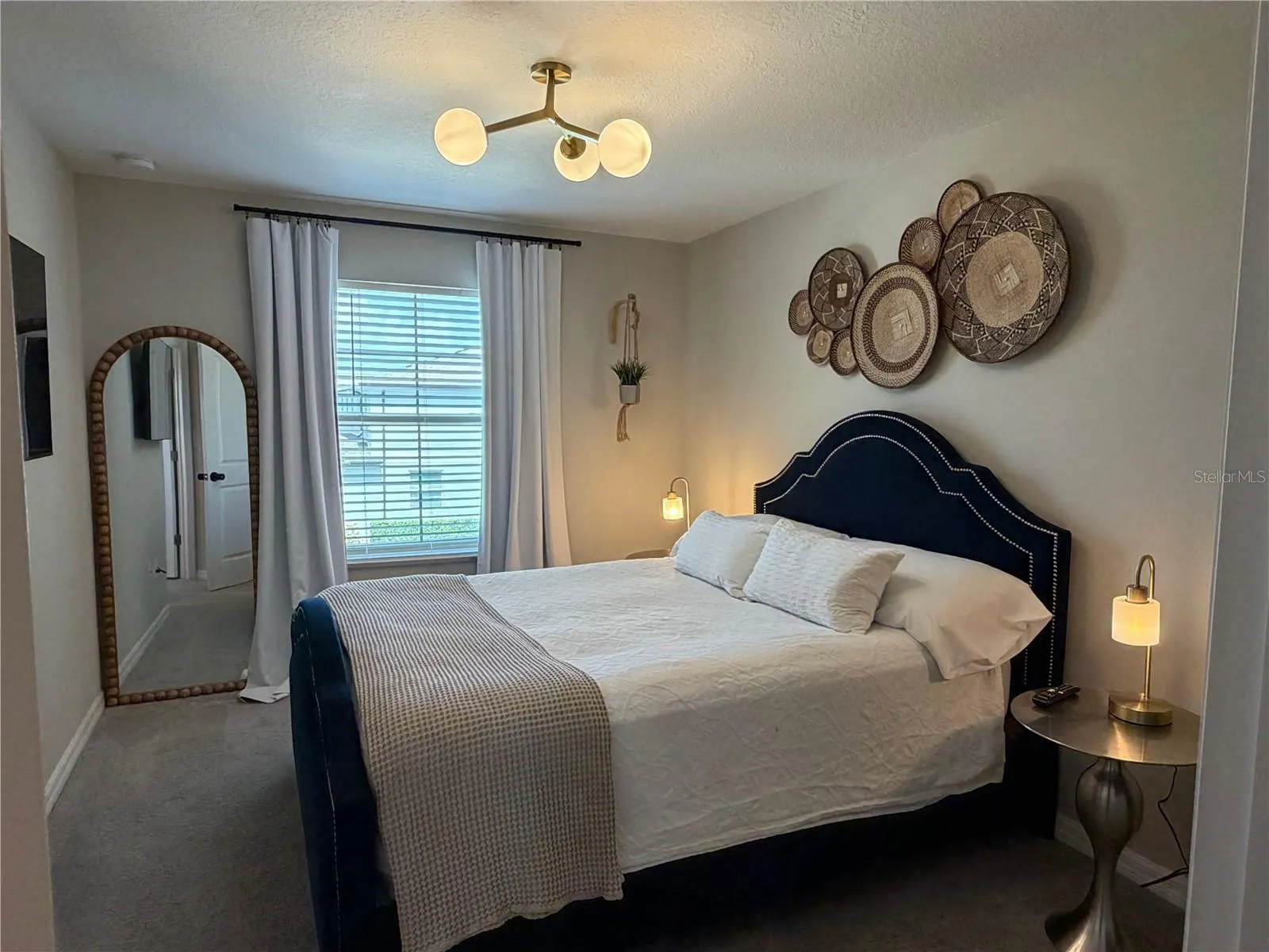 Secondary Bedroom with walk in closet and private ensuite.