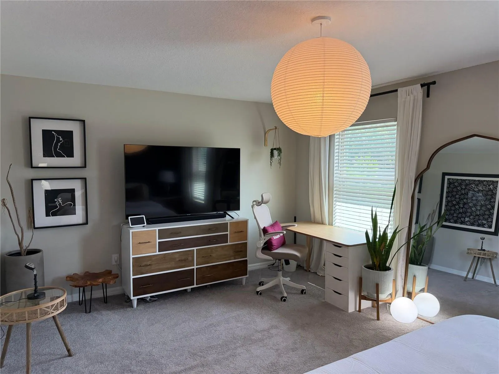 Primary Bedroom with walk in closet and private ensuite.