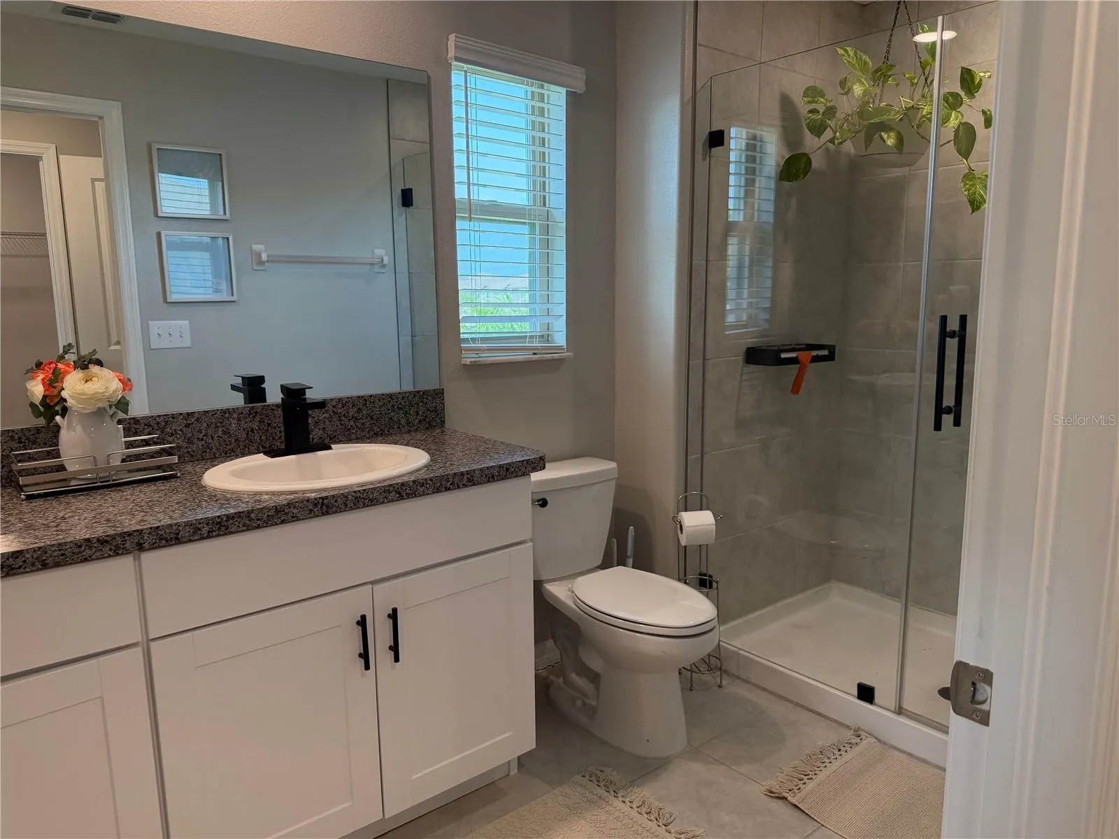 Primary Bedroom with walk in closet and private ensuite.