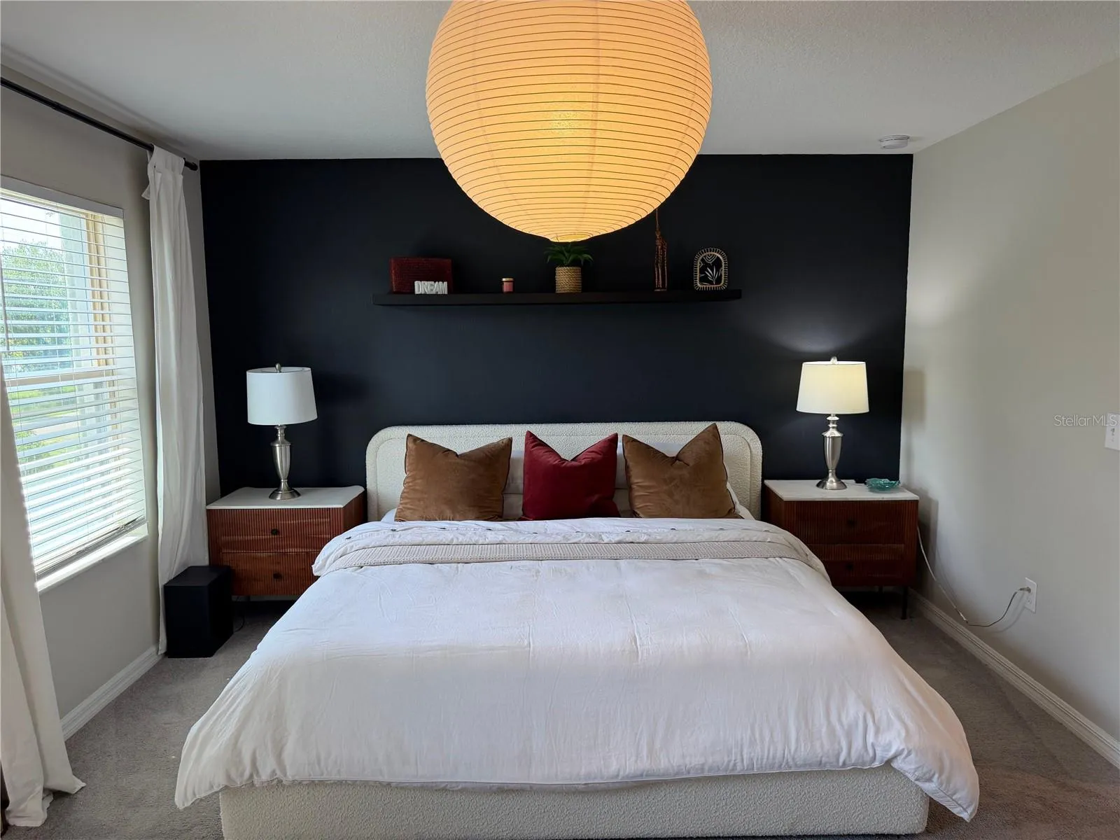 Primary Bedroom with walk in closet and private ensuite.