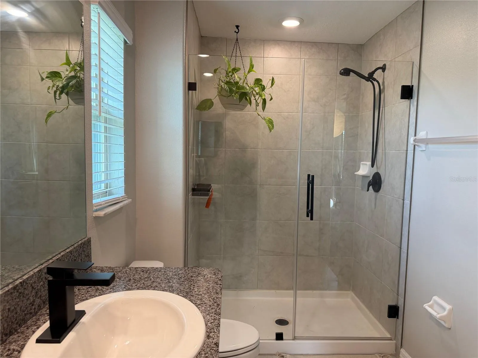 Primary Bedroom with walk in closet and private ensuite.