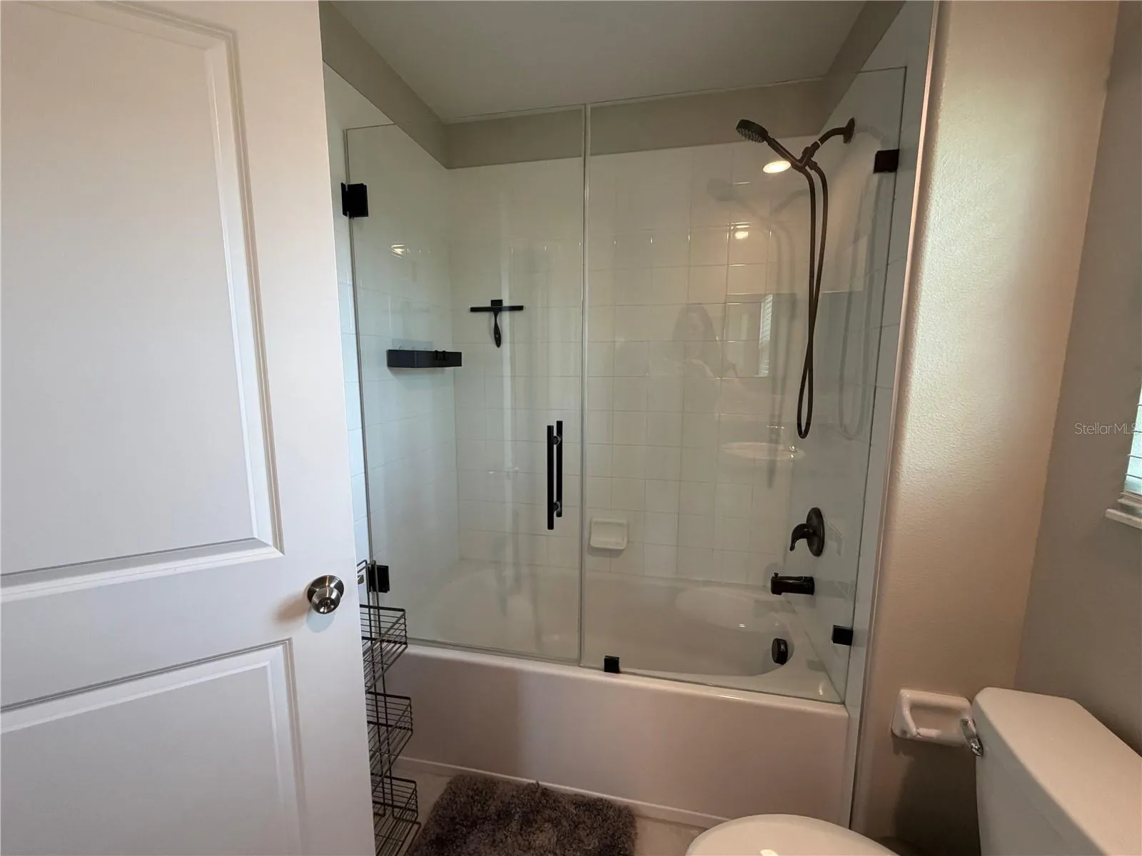 Secondary Bedroom with walk in closet and private ensuite.