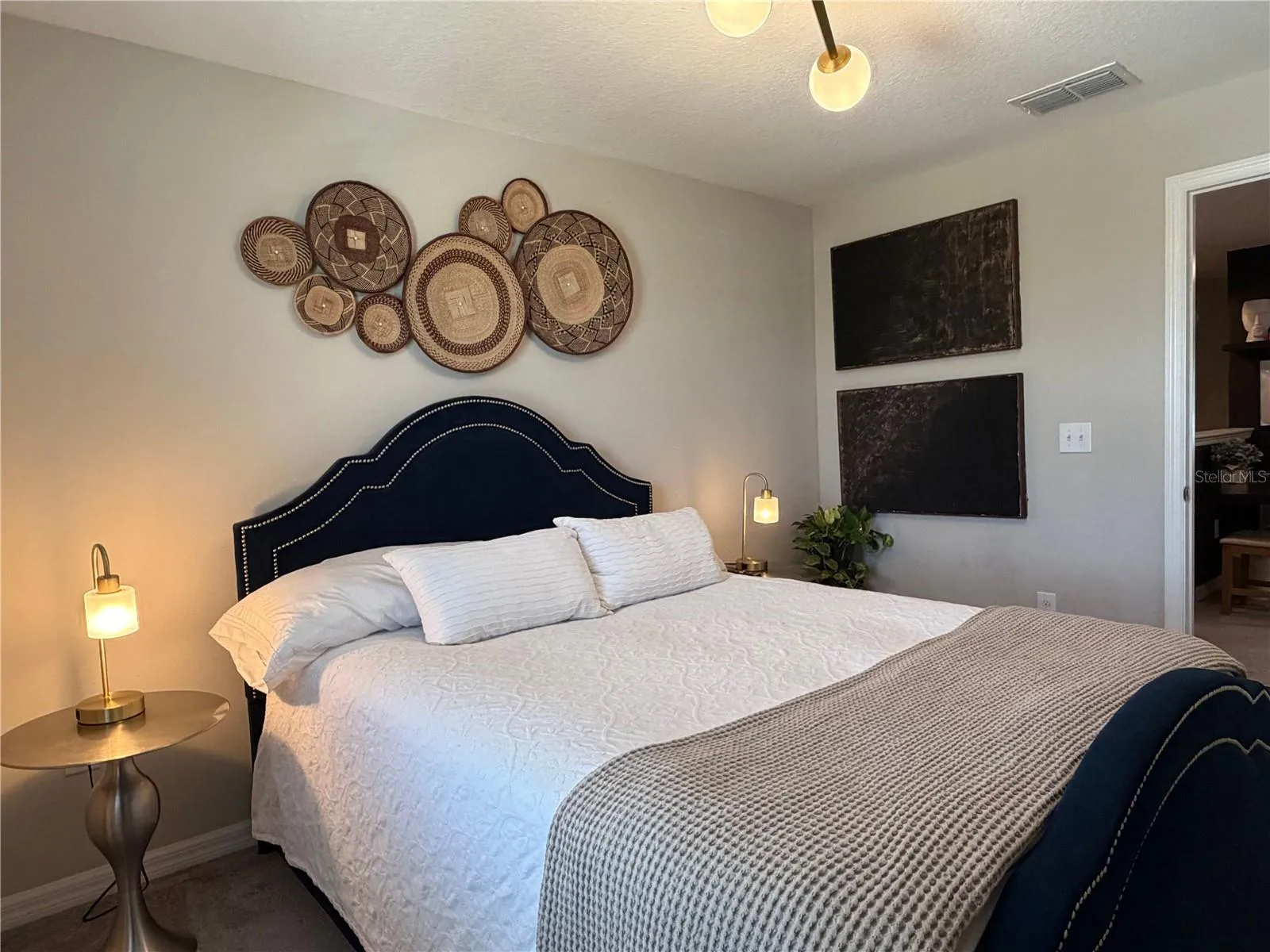 Secondary Bedroom with walk in closet and private ensuite.