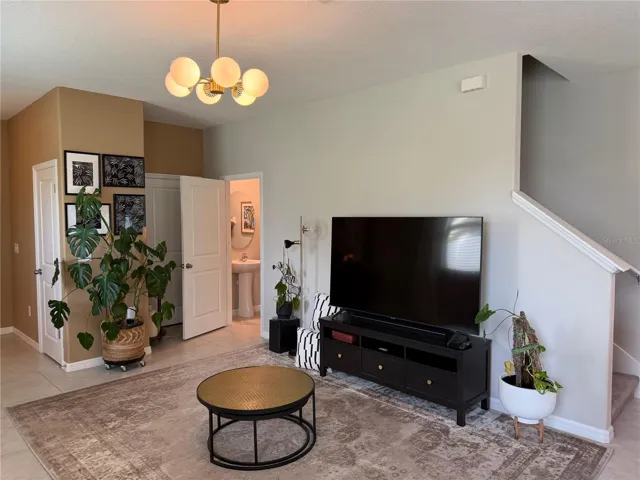 Livingroomw with half bath and garage access