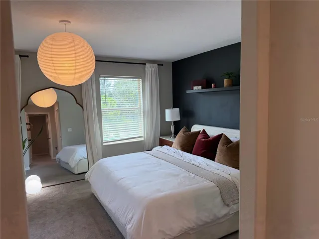 Spacious Primary Bedroom with walk in closet and private ensuite.