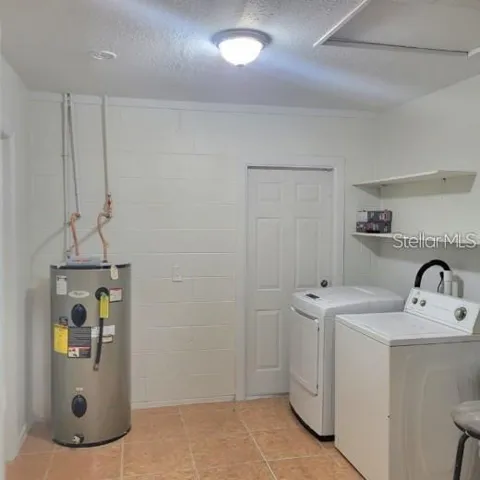 Laundry Area Newer Hot Water Heater 2024 and No Washer or Dryer.
