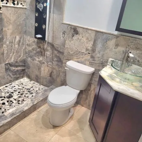 Former Primary Bath with Custom Shower and Sink Xabinet