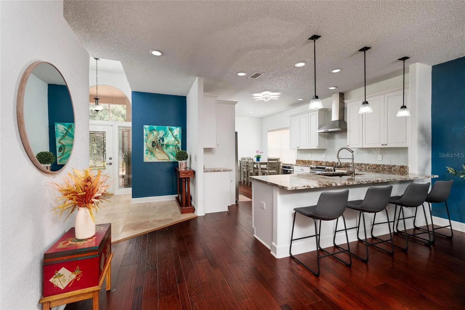 Kitchen with plenty of room for sitting at the counter.  There is an eat in kitchen area to the rear of the kitchen.