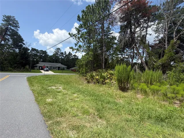 FRONT OF LOT LOOKING TOWARD STOP SIGN