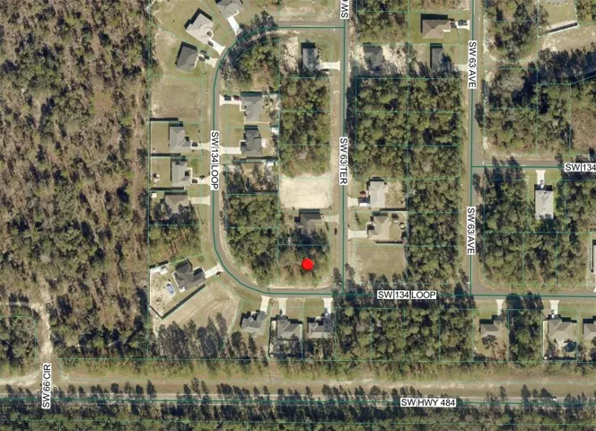 ARIAL VIEW OF LOT AND NEW HOMES IN THE AREA.