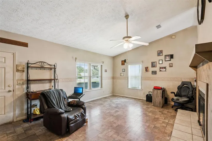 View of living room and fireplace