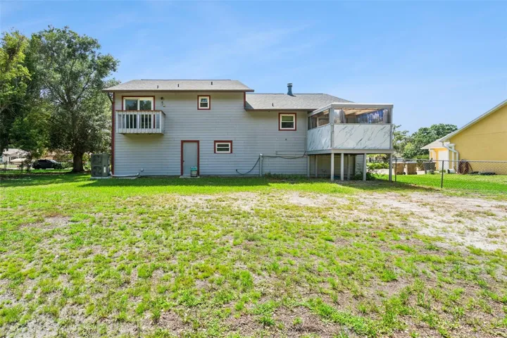 View of property from backyard facing west