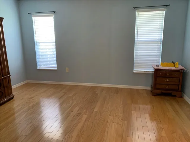 King size master bedroom offers walk-in closet and ensuite semi updated bath