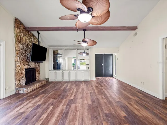 Living room with decorative fireplace