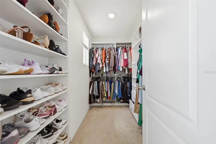 Primary Custom Built Closet (Hers)