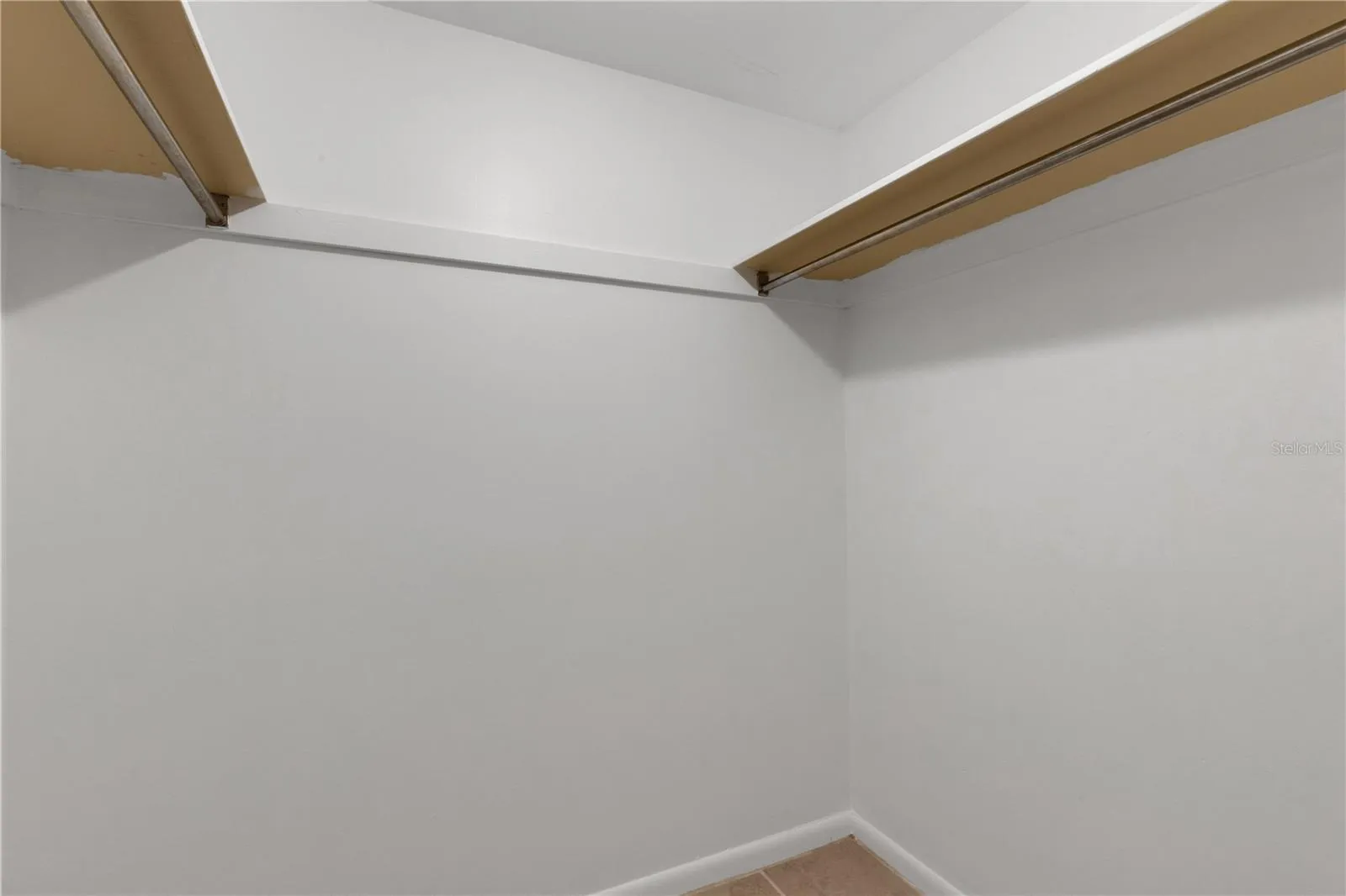 Walk in closet and bath separate the bedrooms