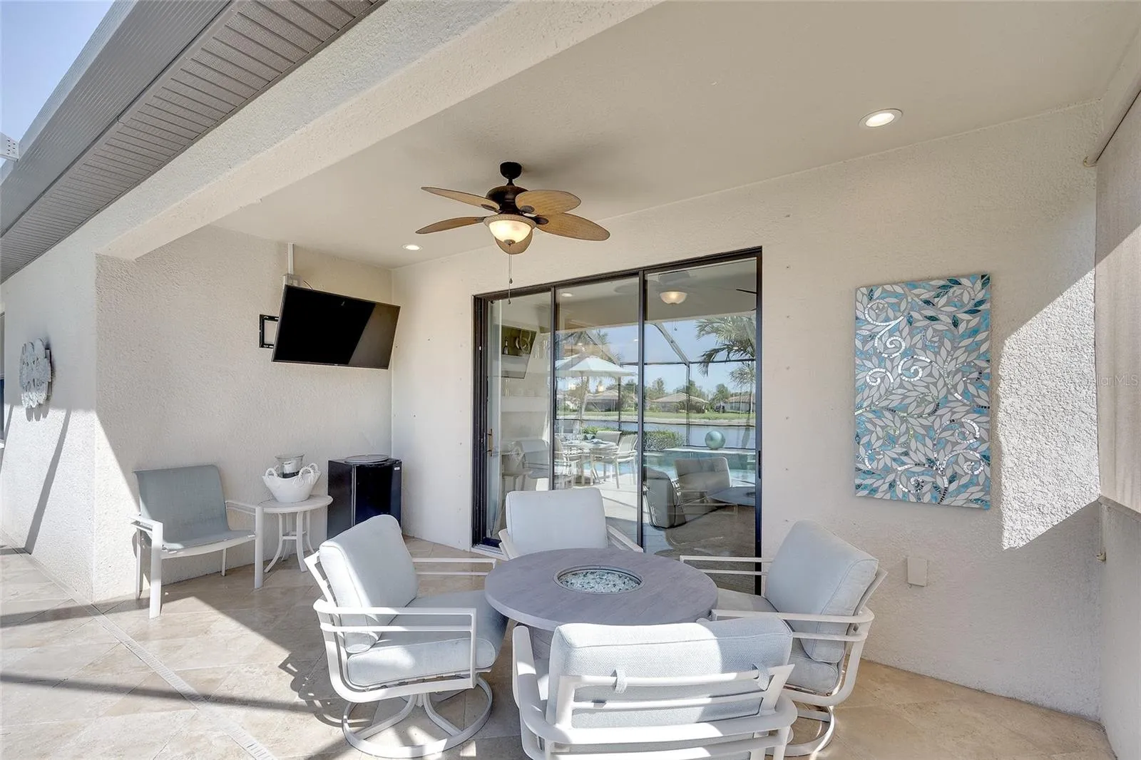 Covered Outdoor Living Area with Fire Pit Table