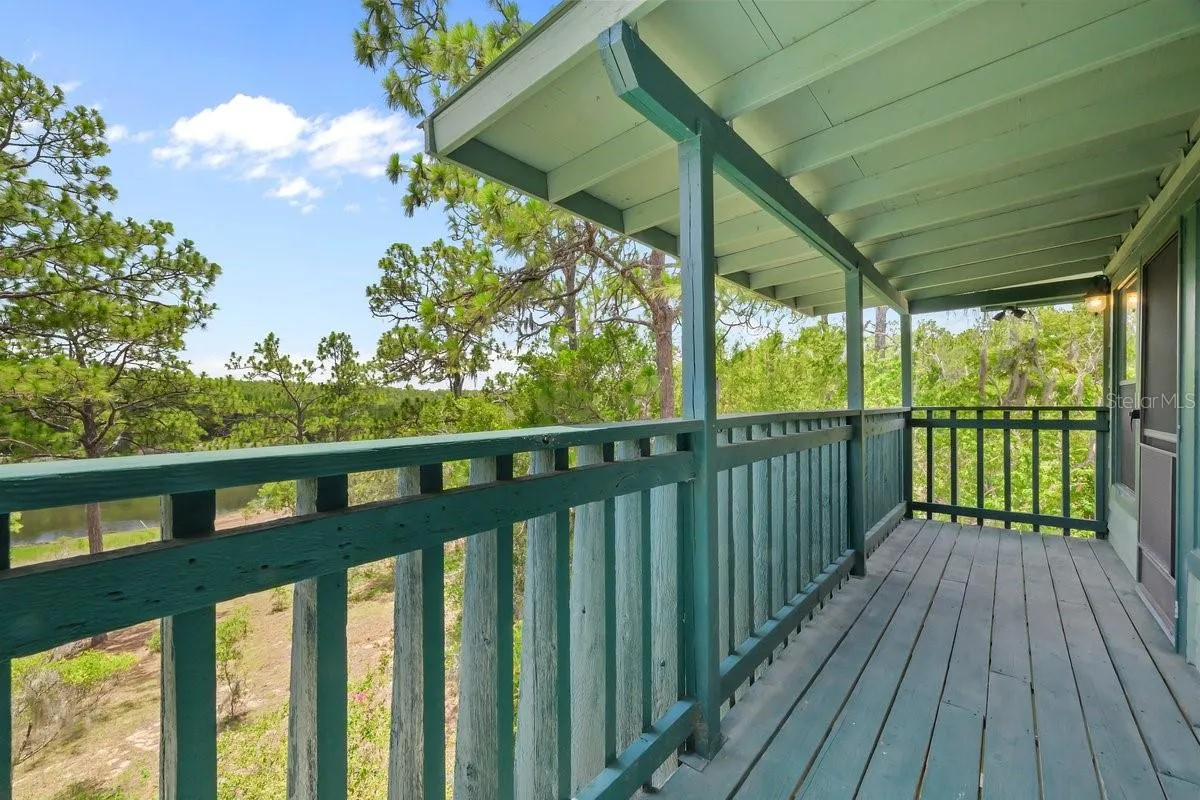 Primary bedroom with Private Back Deck,(2nd floor) great views of Hour Glass Lake