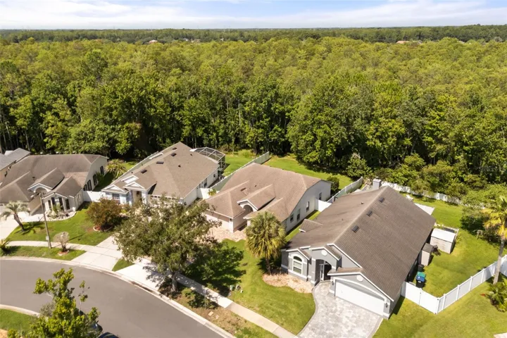 2914 Saint Augustine Dr. sits on a private road and backs up to beautiful conservation.