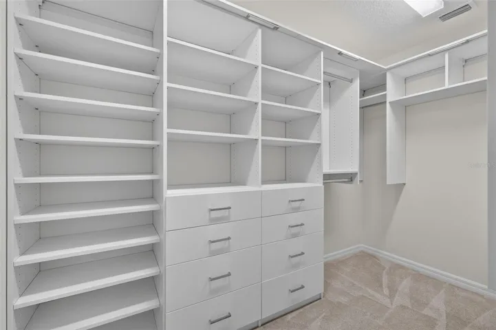 Primary Bedroom Customized Walk-In Closet