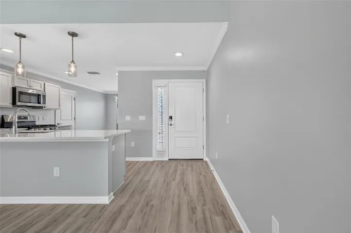 Foyer, Front Entry, and Kitchen