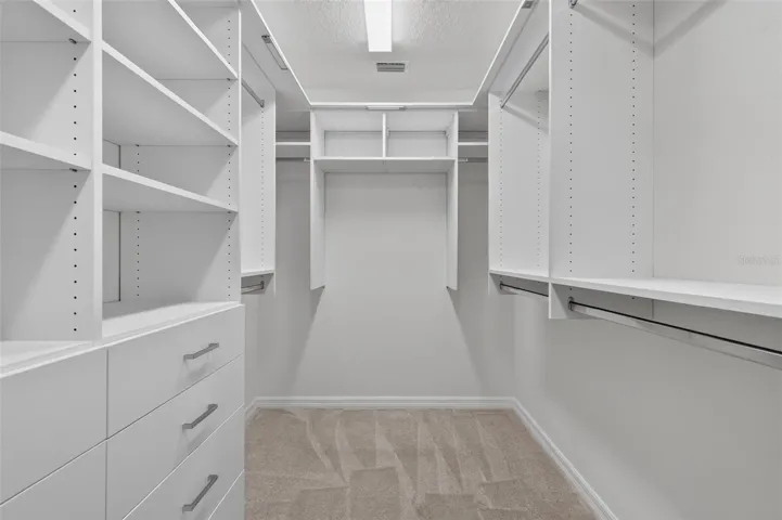 Primary Bedroom Customized Walk-In Closet