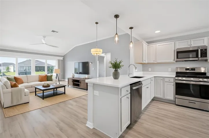 Kitchen, Dining, and Living Rooms-Virtually Staged