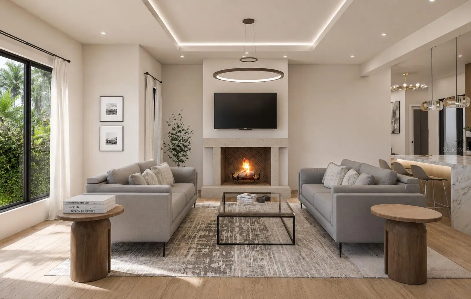 Grand family room with gas fireplace insert and custom accents throughout