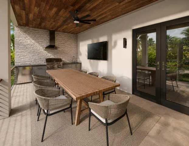 Artisan styled outdoor kitchen with tounge and groove ceiling on the lanai