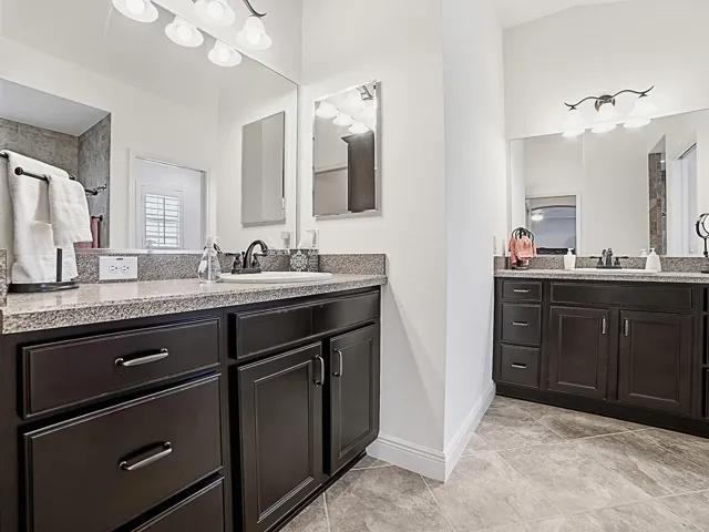 Master bath with 2 separate vanities.