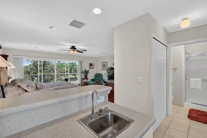 View of second floor Bedroom/Screened /Covered Balcony from Kitchenette