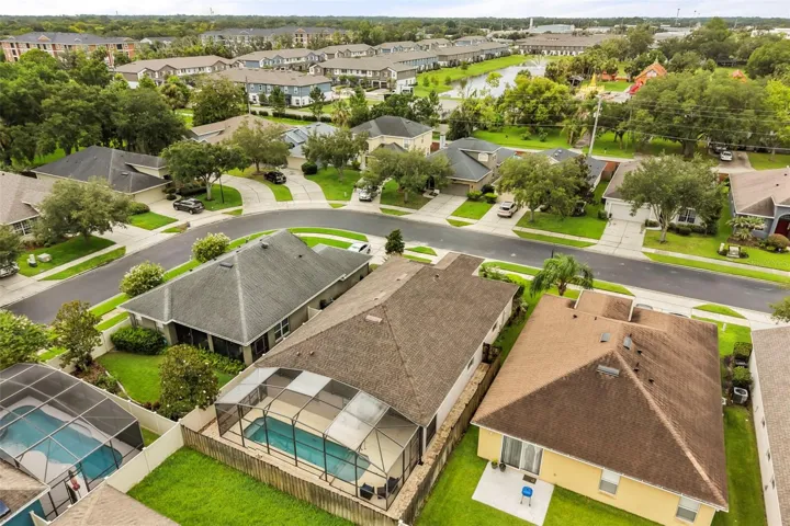 Enjoy Florida living in the screened-in pool and lanai with a covered patio, all overlooking a fully fenced backyard with a wood privacy fence.