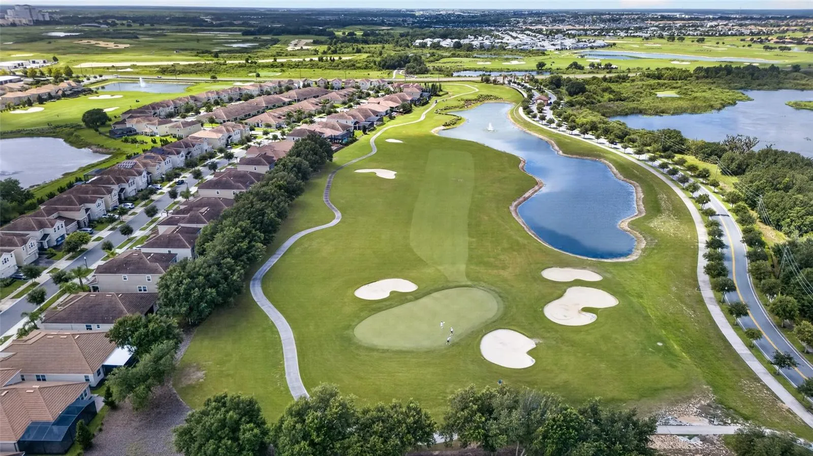 Resort-style living at ChampionsGate! Enjoy incredible community amenities including resort pools, a lazy river, water slides, splash areas, clubhouse, fitness center, dining, sports courts and more—all designed to make every day feel like a vacation.